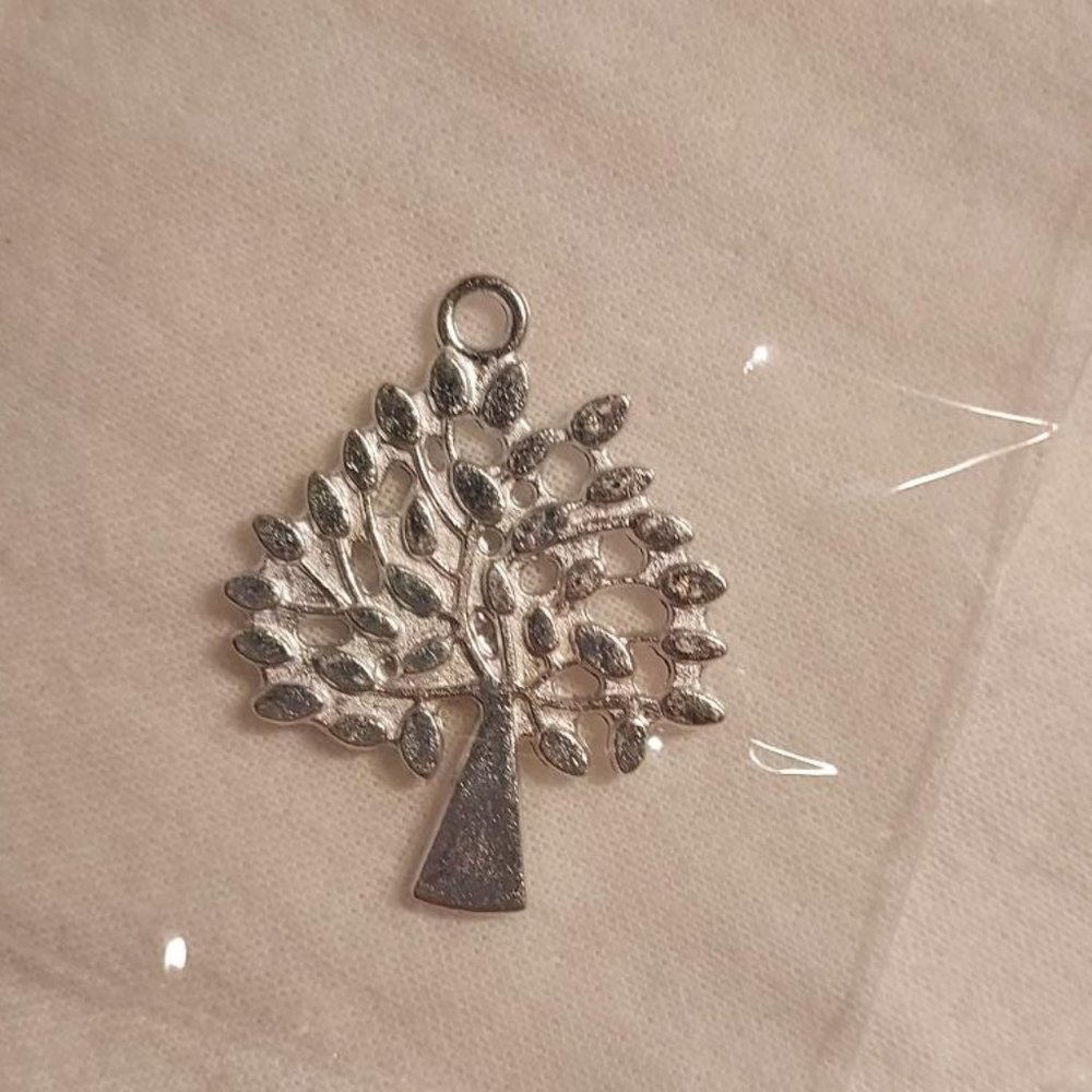 Silvertone tree of life charm, new.